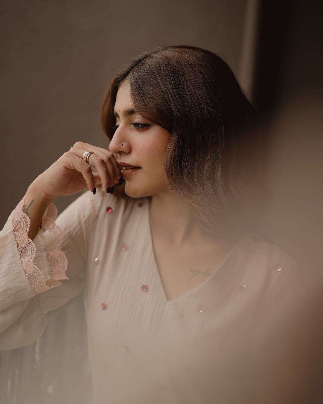 Priya Warrier in Ivory Chanderi and Organza Kurti Set